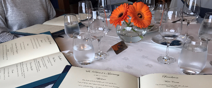 Diners seated with menus on-board Saga Pearl cruise ship