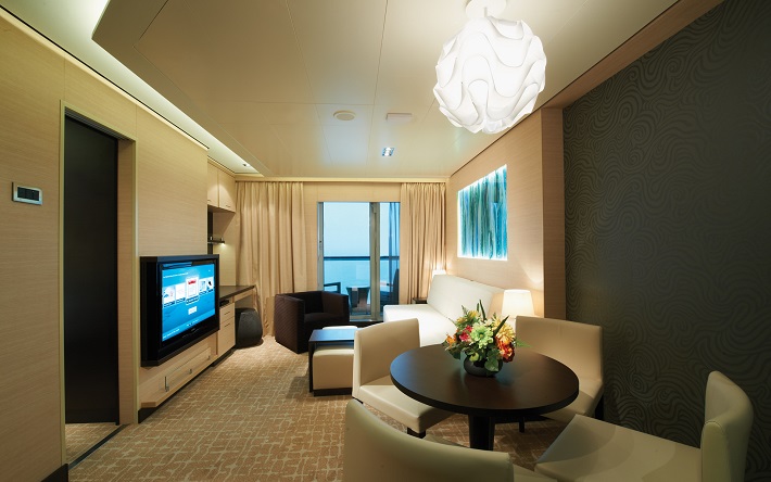 The living area of a Haven Family Villa on an NCL cruise ship