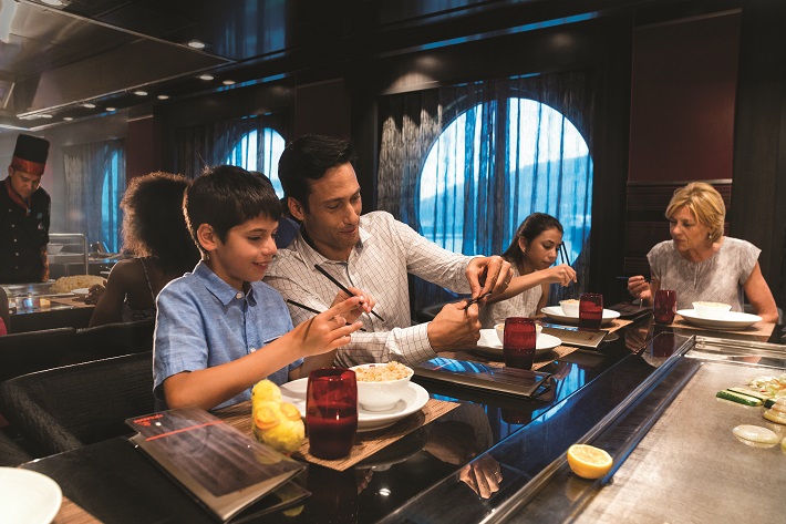 A family dining on Asian cuisine at Royal Caribbean's Izumi restaurant