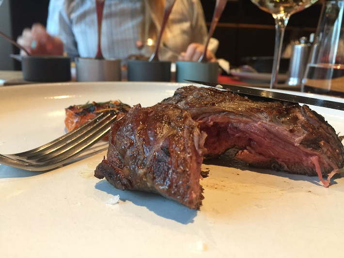 A plate of rare steak in the Butcher's Cut restaurant on-board MSC Meraviglia