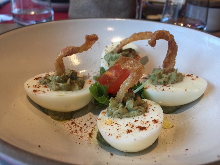 Egg, pesto and tomato dish in a restaurant on-board MSC Meraviglia