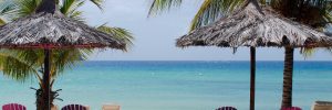 Beach chairs and sun loungers on a beach in the Caribbean