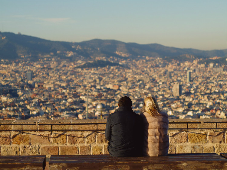 Tourists admiring the view of Barcelona during winter