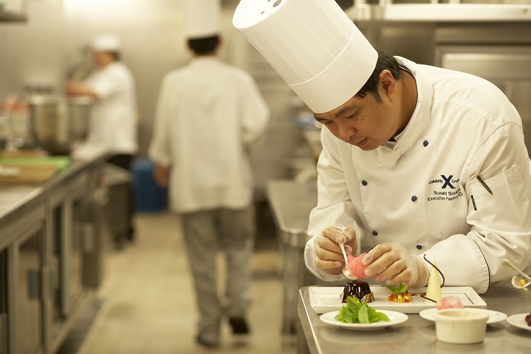 A chef preparing healthy meals on a Celebrity Cruises ship