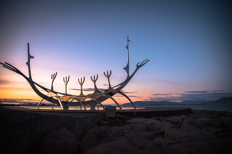 The Sun Voyager statue seen at the Old Harbour in Reykjavik at sunset