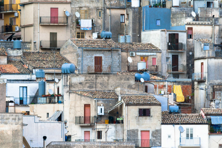 Houses lining the cliffs of Caltabellotta in Sicily