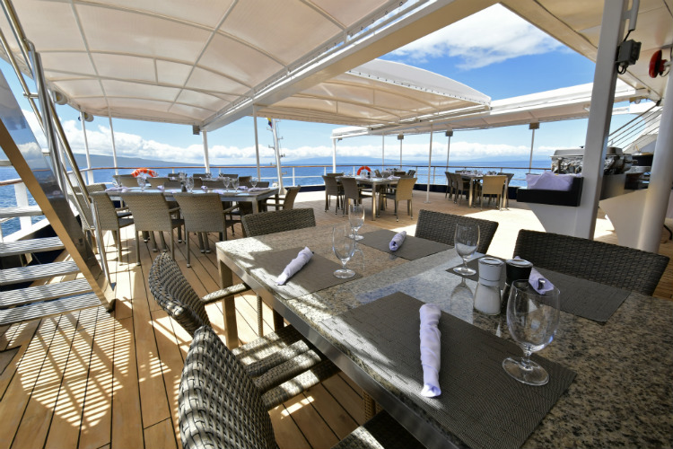 Alfresco dining tables on the Celebrity Xperience cruise ship