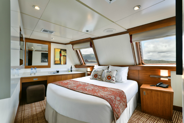 A welcoming, ocean view stateroom on-board Celebrity Xperience
