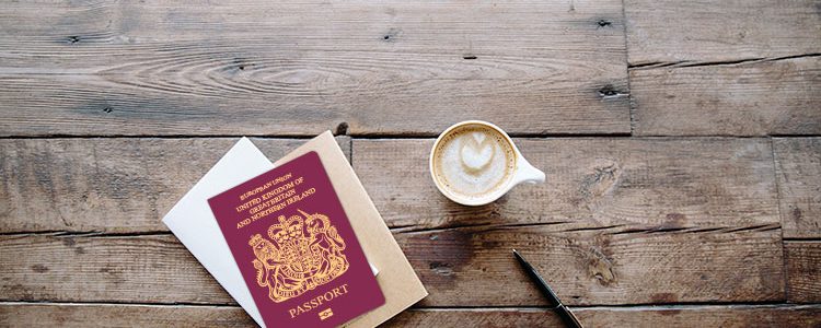 Passport on wooden table