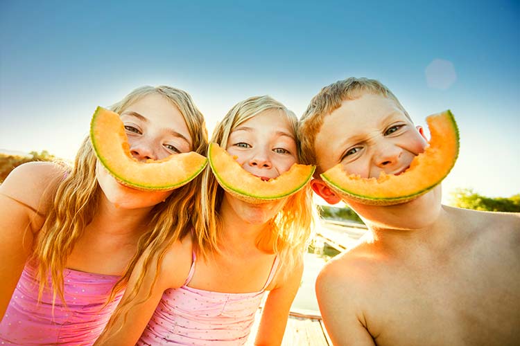 Children Eating melon