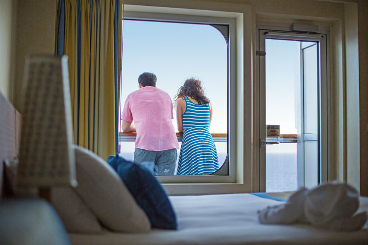 Couple on the balcony in the stateroom