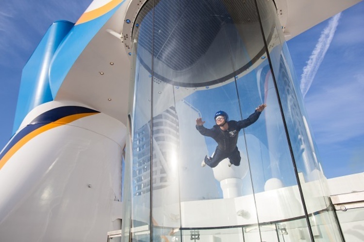 A man using the indoor skydiving tunnel