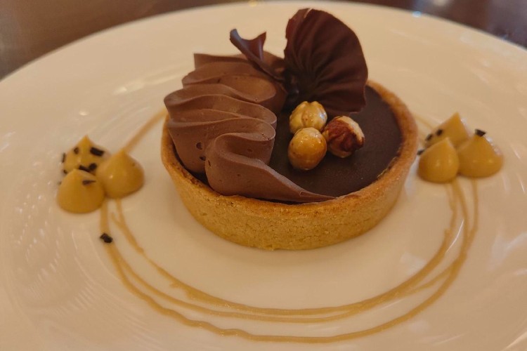 Hazlenut tart served in The Wake